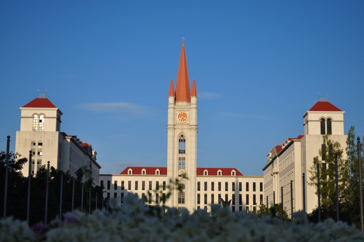 the europe building of clock tower in abac university bangna bangkok thailand
