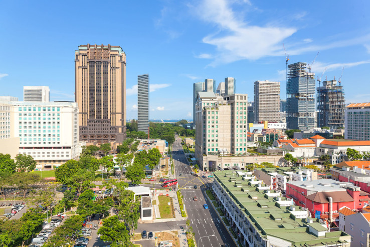 Photo: Construction of Skyscrapers at Bugis Street Shopping District in Singapore daytime