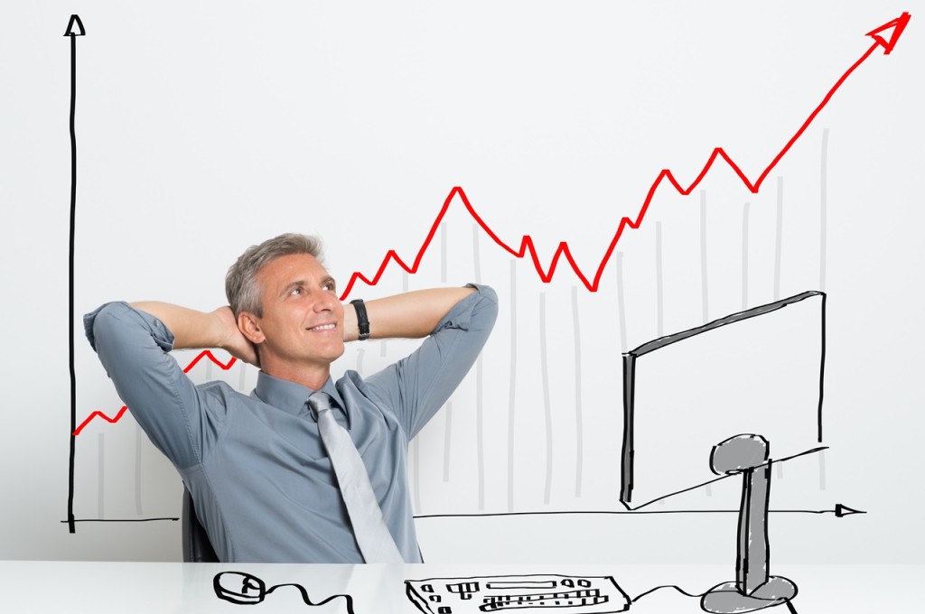 Happy businessman with growing share