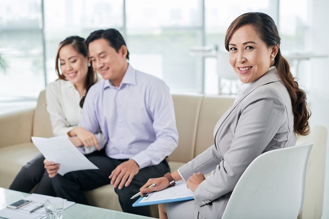 Encourage foreigners to buy local property to solve overhang issue