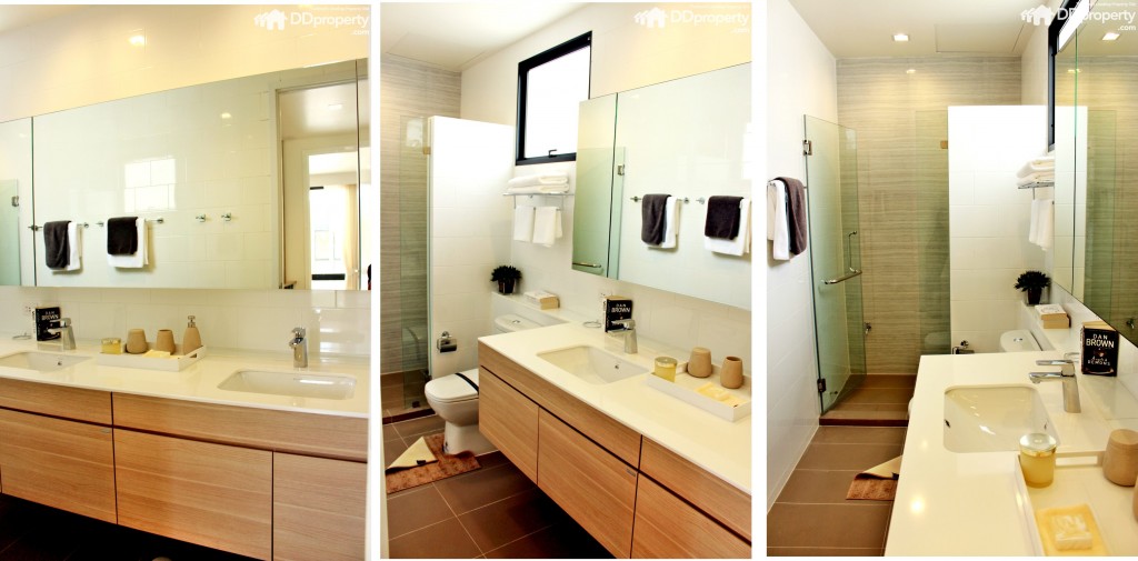 มุมมองภายในห้องน้ำเน้นลวดลายธรรมชาติ และโทนสีขาว