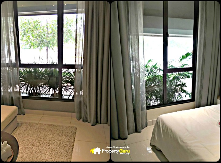 Although there are no balconies, the walls holding the large powder-coated aluminium windows in the hall and Master Bedroom (left and right) are also made of the same glass, allowing crystal clear views of the Seri Kembangan skyline and more than enough fresh air and sunlight through. The potted plants outside the windows are for showroom display only. In the actual building, there will be no flower pot ledges outside