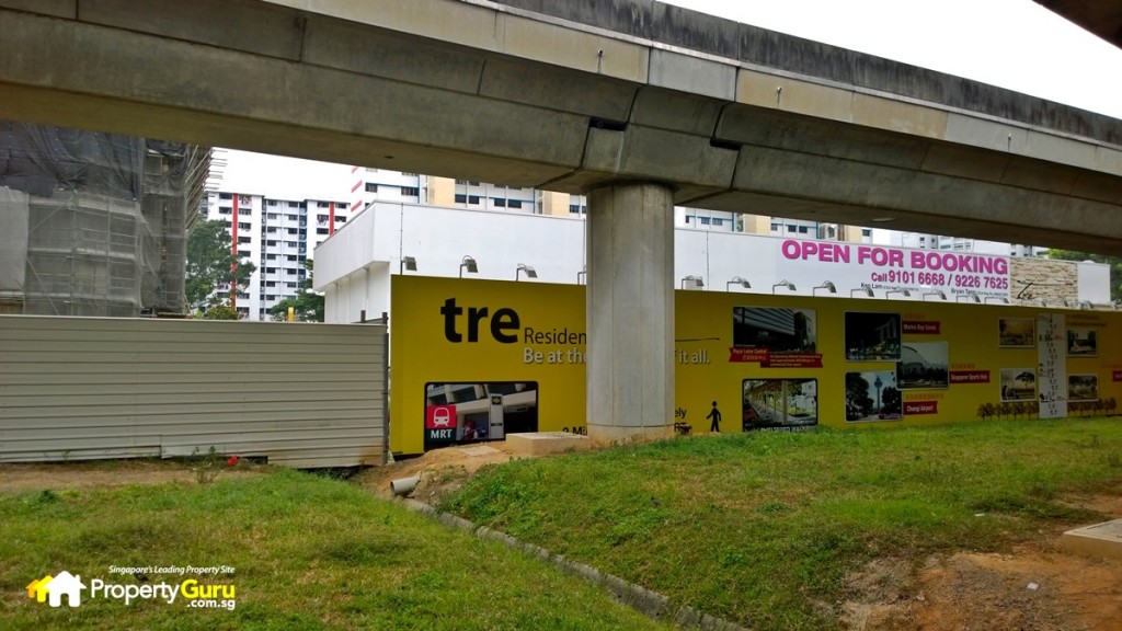 Tre Residences showflat behind the hoarding and train tracks