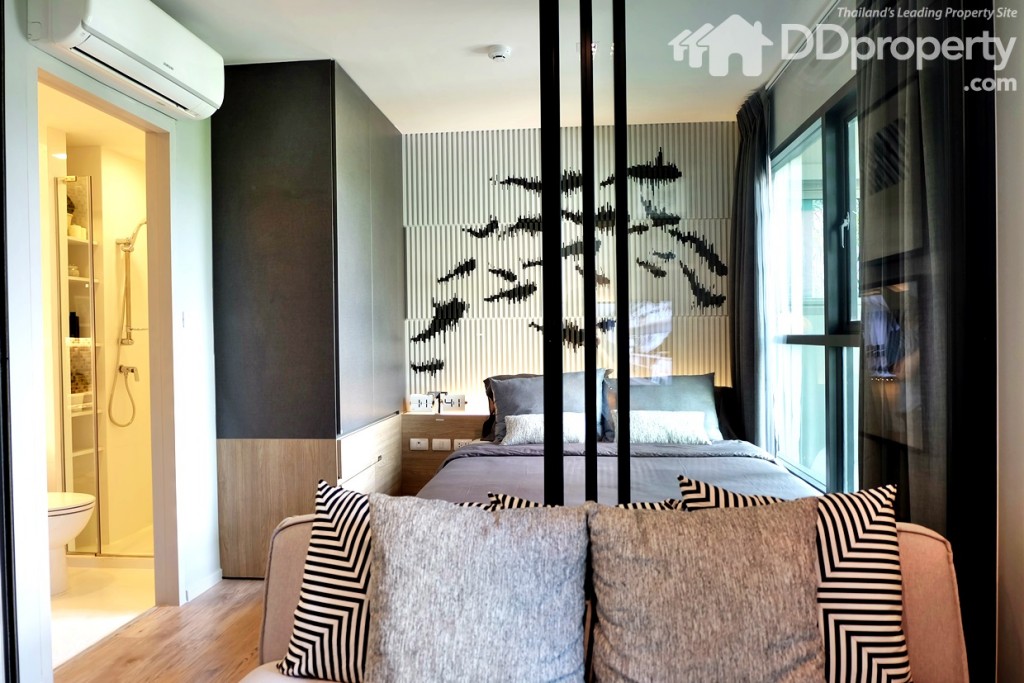 พื้นที่ห้องนอนอยู่ด้านหลังห้องนั่งเล่น