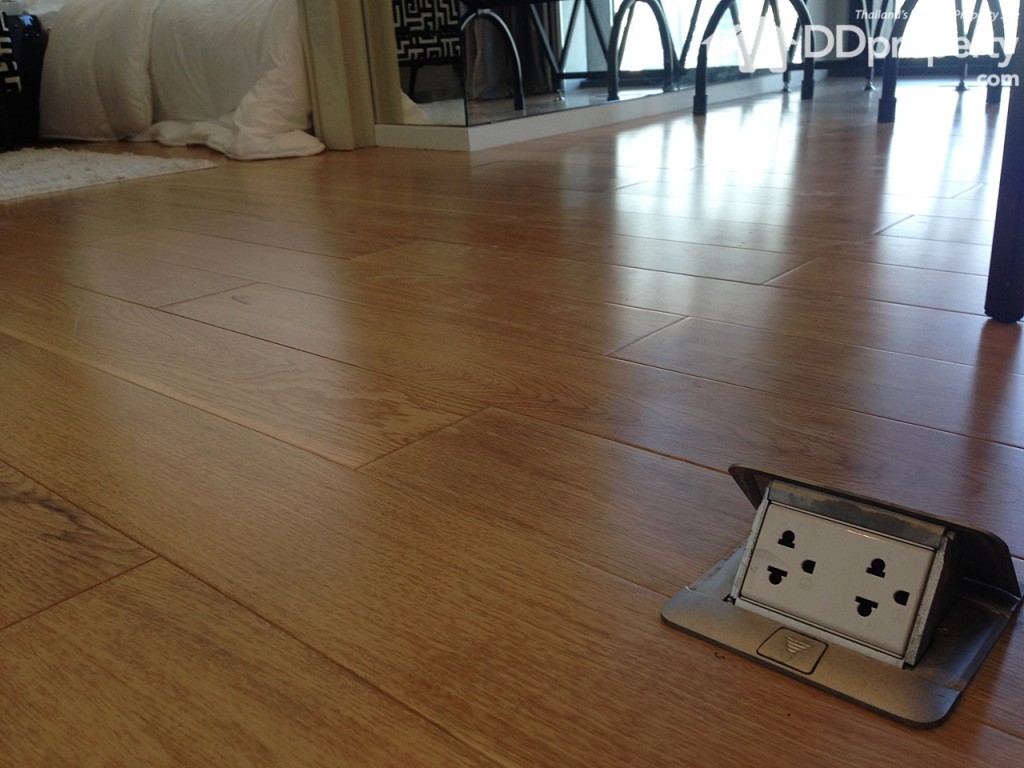 Outlet hidden beneath the floor