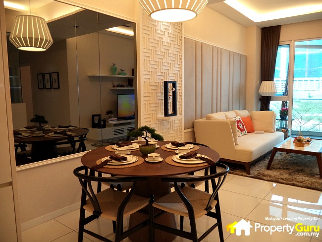 The dining area flows into the living room and balcony