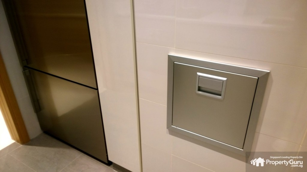 Rubbish chute opposite sink and induction stove