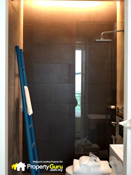 First look of the master bathroom with a larger rain shower. What you see here is what you'll get in the actual unit