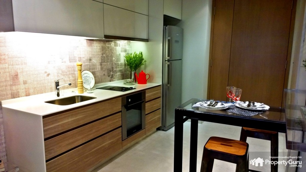 Alex Residences 2BR kitchen and dining area