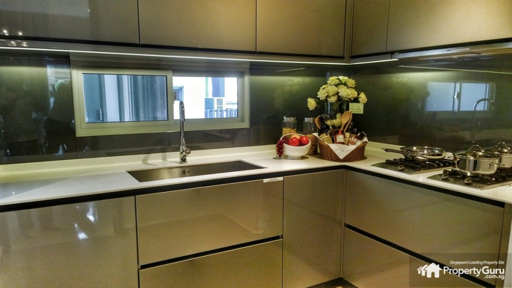 Wet kitchen with anti-slam cabinets, bomb shelter and door to serviced elevator