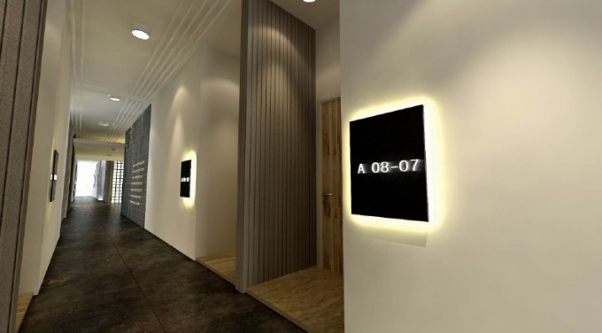 The hotel-like residential corridors. The 12 units on every floor are served by 5 lifts