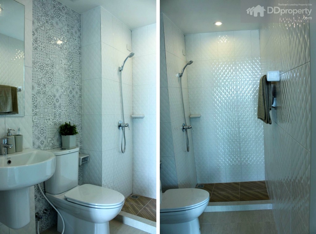 ห้องน้ำเน้นโทนสีขาวเช่นเคย ไม่มีฉากกันอาบน้ำให้ แต่แยกส่วนเปียก-แห้งไว้