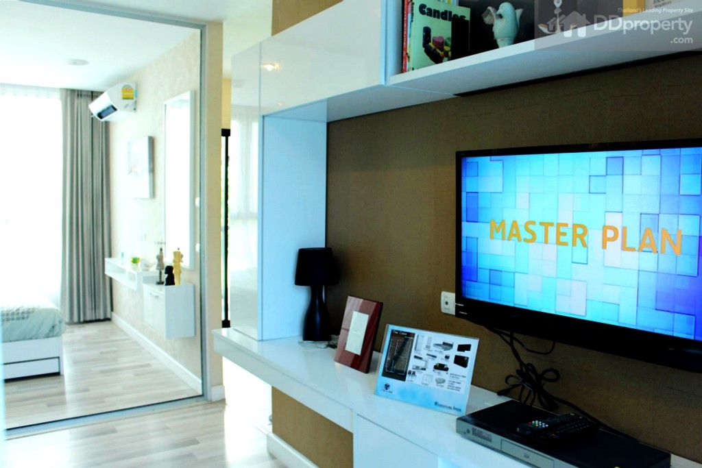 ชั้นวางทีวีบิลท์อินสีขาว ขนาด 50 x 120 ซม. โดยประมาณ