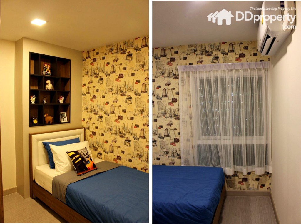 มุมมองภายในห้องนอนเล็กดูโปร่งเพราะความสูงห้องที่ 2.4 เมตร