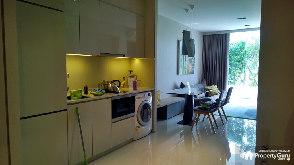 The Wisteria 1BR living room and open kitchen