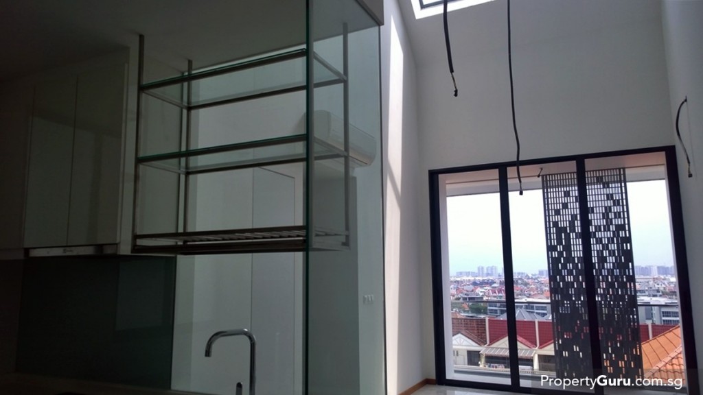 penthouse living room and kitchen with high ceiling