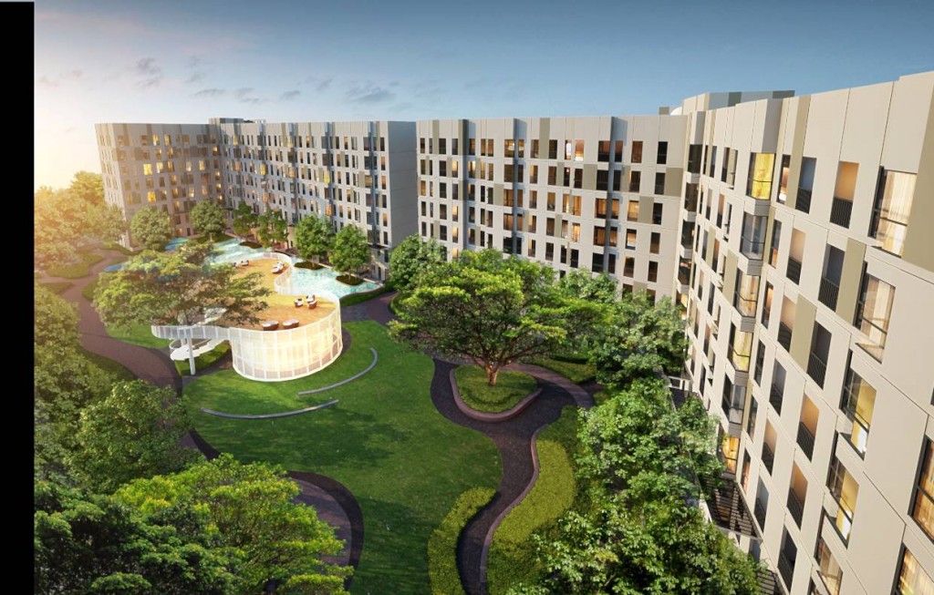 ภาพมุมสูงของพื้นที่ส่วนกลางภายในโครงการ แสดงให้เห็น ลักษณะ "L-shape" ของการวางผังของโครงการ