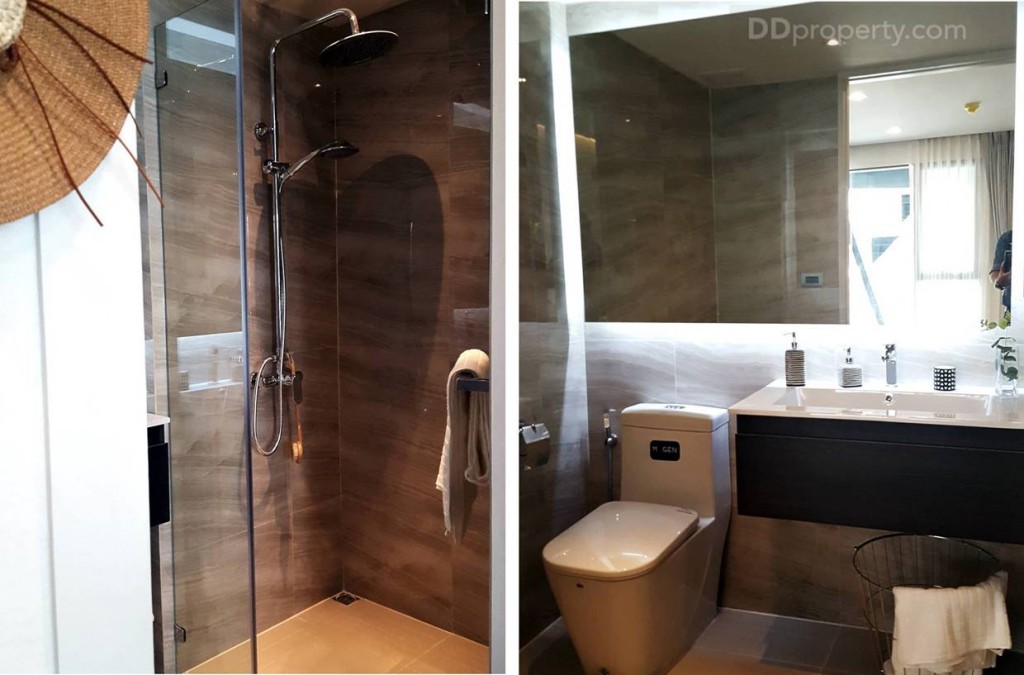 ภายในห้องน้ำมีการแยกส่วนแห้ง-เปียกอย่างชัดเจน ด้วยกระจกกั้นอาบน้ำ พื้นเป็นกระเบื้องแกรนิตโต้ขนาด  60 x 60 ซม. ห้องอาบน้ำมีทั้งฝักบัวแบบธรรมดาและ Rain Shower ยี่ห้อ Rasland โดยทางโครงการมีเดินระบบน้ำอุ่นมาให้