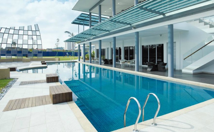 This swimming pool is located at the back of the clubhouse