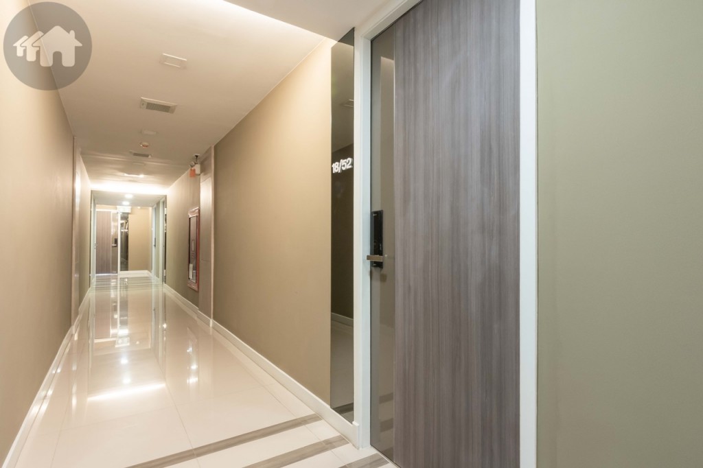 Corridor in front of the room is well lit and is 1.45 metres wide. The main entrance stretches in full height.