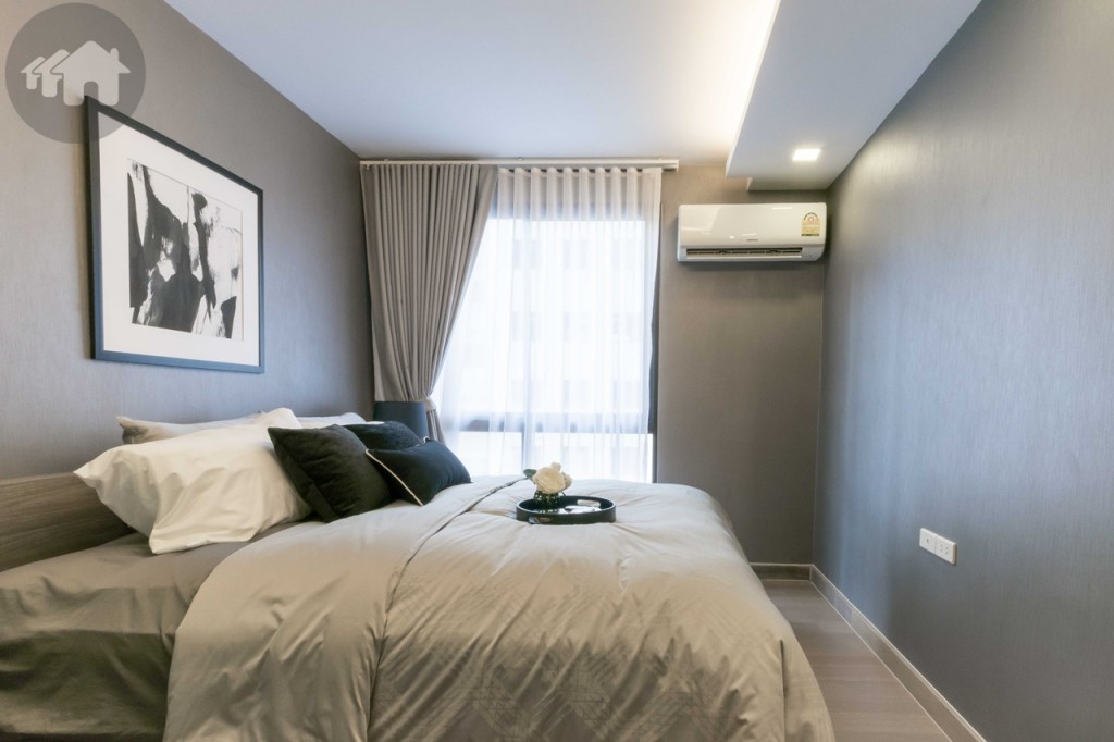 On a plain wall at the end of the bed, you can set up a wall-mounted TV on as there are power and cable sockets. The distance between wall and bed is around 70 cm