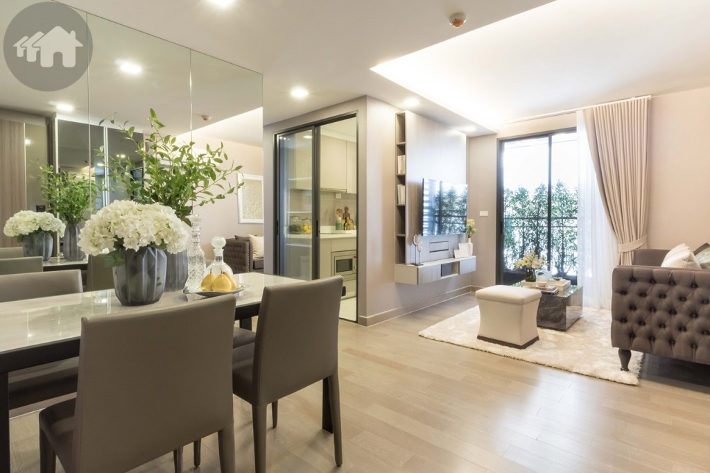 Instead of a kitchen, 2-Bedroom units greet you with an open space comprising dining and living areas (a larger dining table compared with 1-Bedroom’s). However, the flooring is still Engineered wood (except bathroom and balcony) and the ceiling height is 2.50 metres