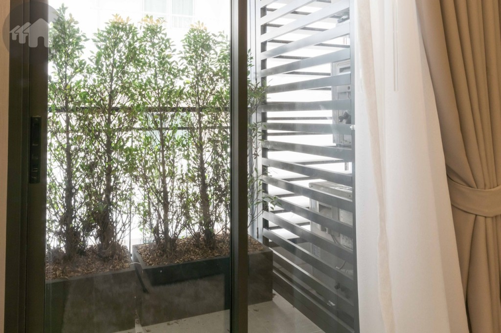 The balcony size is 0.90x1.70 metre, laid with 30x60 tiles, and fenced with 1.20-metre rail. The air-conditioner compressors are stored on the side