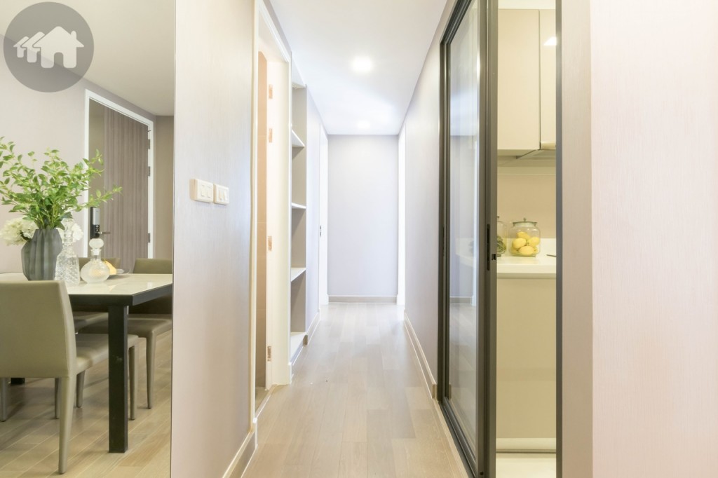 The corridor leading to other rooms with an approximate 1-metre width