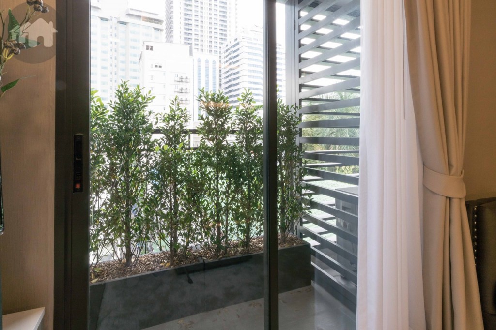 The balcony size is around 0.90x1.70 metre, laid with 30x60 tiles, and fenced with a 1.20-metre rail. The air-conditioner compressors are kept in an enclosure to prevent them from disturbing the project’s appearance
