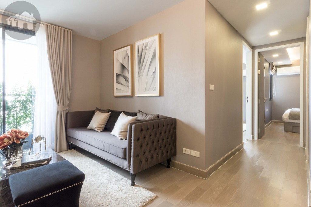 Opposite the kitchen or beside the living room is a corridor (around 1 metre wide) leading to bedrooms