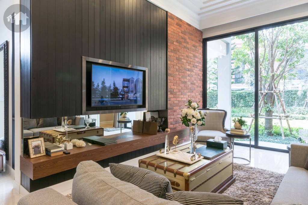 มุมชั้นวางโทรทัศน์ ตกแต่งเป็นผนังก่ออิฐที่เปิดผิวหน้า