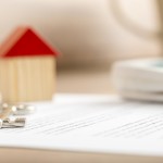 Closeup of contract of house sale ready to be signed