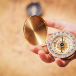 compass in hand.