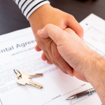 signing rental agreement contract