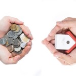 Buying house concept with giving money and key