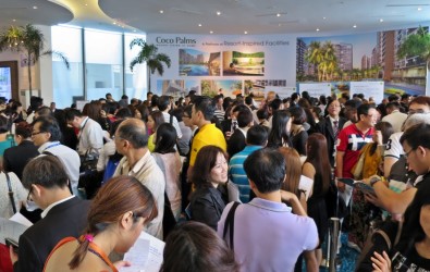 Singaporeans viewing property in a showflat